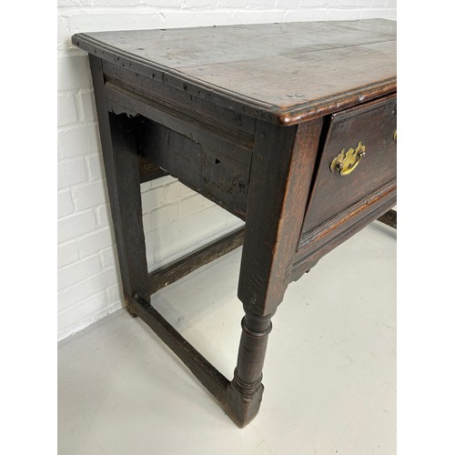 412 - A CHARLES II OAK DRESSER WITH TWO DRAWERS RAISED ON FOUR LEGS JOINED WITH A STRETCHER, 

130cm x 80c... 