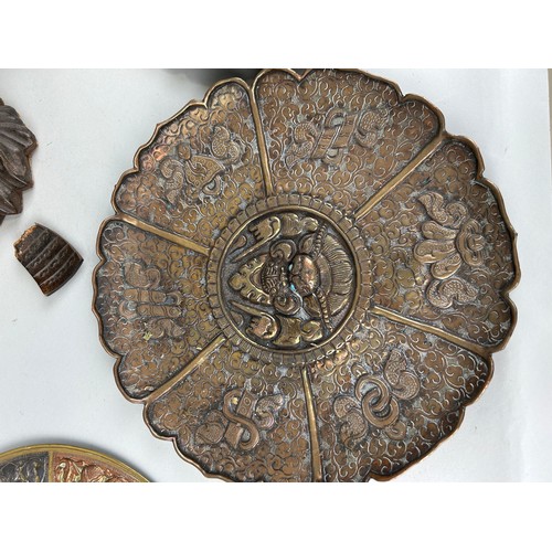 116 - A GROUP OF THREE ISLAMIC METAL TRAYS ALONG WITH A JAPANESE CARVED WOODEN SCULPTURE AND AN INDIAN COP... 