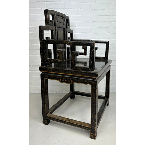 128 - AN EARLY 20TH CENTURY CHINESE BLACK LACQUERED ARMCHAIR, 

102cm x 65cm x 50cm