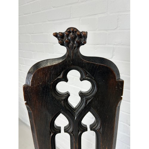 462 - A 19TH CENTURY GOTHIC OAK CHAIR, 

140cm x 38cm x 38cm