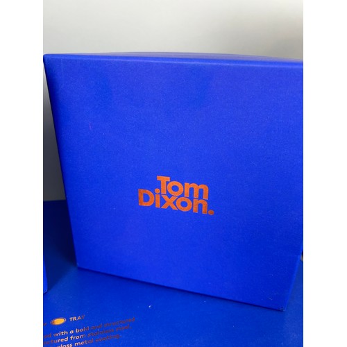 593 - A COLLECTION OF TOM DIXON GLASSWARE AND METALWARE IN ORIGINAL PACKAGING (10 BOXES),

To include six ... 