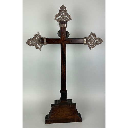 156 - A LARGE WOODEN CROSS POSSIBLY 19TH CENTURY WITH FOREIGN SILVER MOUNTS, 

75cm x 46cm