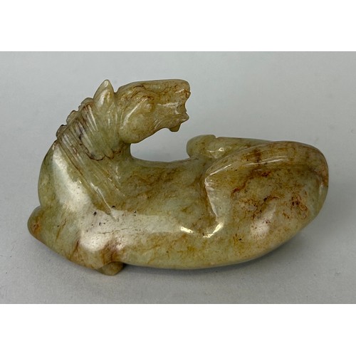 88 - A CHINESE CARVED JADE FIGURE OF A HORSE, 

8cm x 4cm