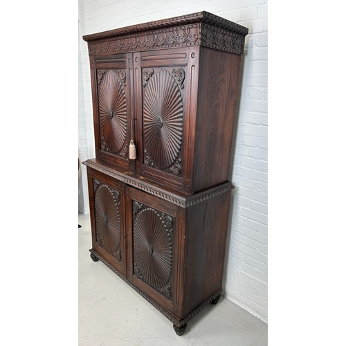 419 - A 19TH CENTURY ANGLO INDIAN ROSEWOOD SECTIONAL WARDROBE WITH SUNBURST DESIGN PANELS, 

194cm x 120cm... 