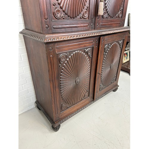 419 - A 19TH CENTURY ANGLO INDIAN ROSEWOOD SECTIONAL WARDROBE WITH SUNBURST DESIGN PANELS, 

194cm x 120cm... 