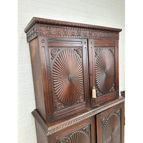 419 - A 19TH CENTURY ANGLO INDIAN ROSEWOOD SECTIONAL WARDROBE WITH SUNBURST DESIGN PANELS, 

194cm x 120cm... 