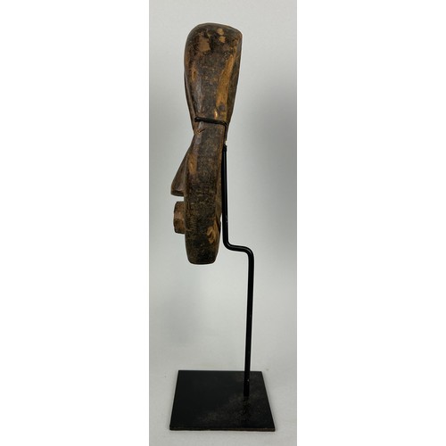 609 - AN AFRICAN TRIBAL MASK, 

23cm x 13cm 

Mounted on stand 38cm