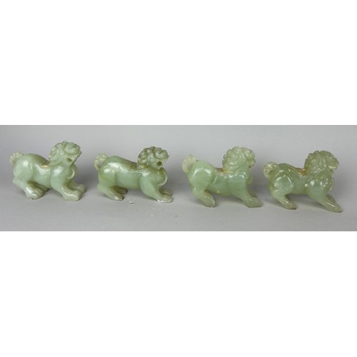 97 - A GROUP OF FOUR CHINESE JADE LIONS (4), 

10cm x 7cm each.