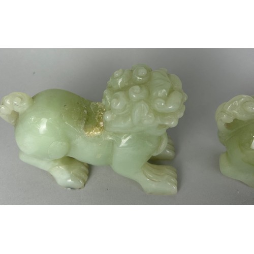 97 - A GROUP OF FOUR CHINESE JADE LIONS (4), 

10cm x 7cm each.