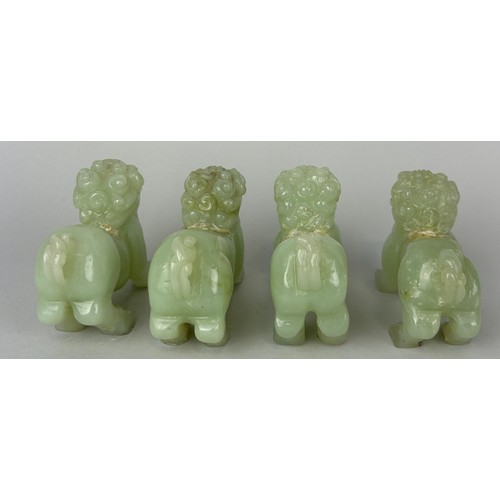 97 - A GROUP OF FOUR CHINESE JADE LIONS (4), 

10cm x 7cm each.