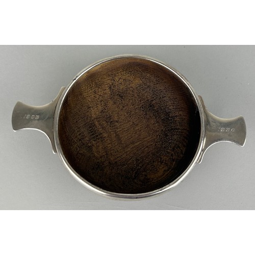 151 - AN EARLY 20TH CENTURY SCOTTISH SILVER QUAICH,

15cm diameter