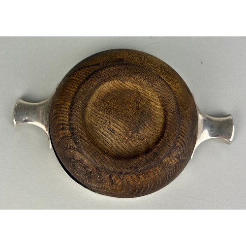 151 - AN EARLY 20TH CENTURY SCOTTISH SILVER QUAICH,

15cm diameter