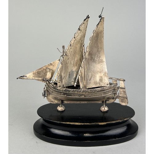 152 - A SILVER JUNK SHIP MOUNTED ON STAND, 

12cm x 12cm including stand.