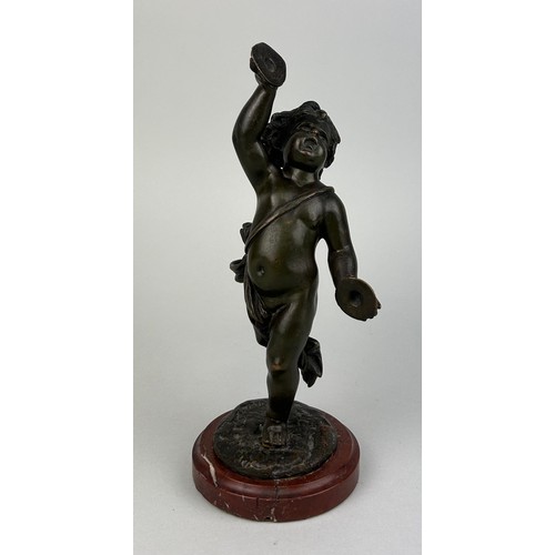 138 - A 19TH CENTURY FRENCH BRONZE SCULPTURE OF A PUTTI AFTER CLAUDE CLODION (1738-1814) ON A RED MARBLE B... 