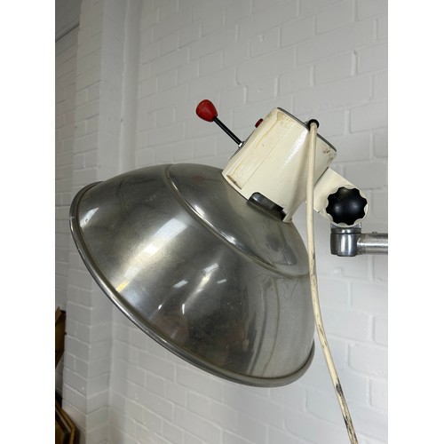 478 - A HOSPITAL STANDING LAMP CHROME OR ALUMINIUM CIRCA 1950'S, 

On four castors.

200cm H