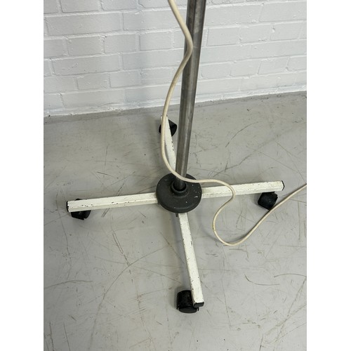 478 - A HOSPITAL STANDING LAMP CHROME OR ALUMINIUM CIRCA 1950'S, 

On four castors.

200cm H