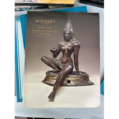 127 - A LARGE COLLECTION OF ASIAN ART CATALOGUES FROM SOTHEBY'S, CHRISTIES, SPINK AND OTHER AUCTION HOUSES... 