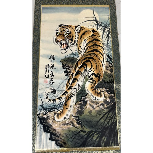 105 - TWO CHINESE SCROLL PAINTINGS DEPICTING TIGERS
(2)

125cm x 42cm, scroll 208cm x 45cm 
96cm x 49cm, s... 