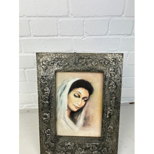 164 - AN ARTS AND CRAFTS STYLE SILVER PICTURE FRAME, 

Print of lady within. 

40cm x 29cm