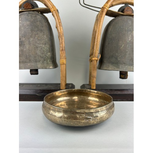 114 - A PAIR OF BUDDHIST BRONZE ELEPHANT BELLS OR GONGS AND A SINGING BOWL (3), 

Each gong 43cm x 38cm 

... 