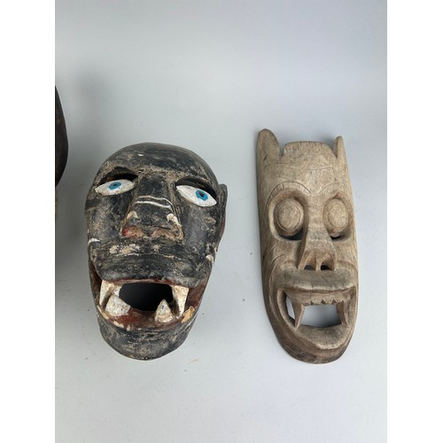 121A - A GROUP OF FOUR AFRICAN TRIBAL MASKS (4),