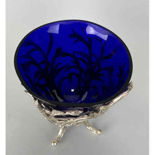 149 - A SILVER PLATED SWEET MEAT DISH WITH BLUE GLASS INSERT, 

12cm H