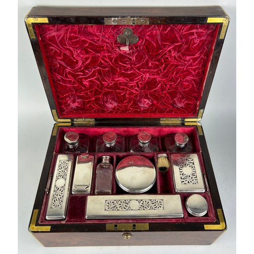 148 - A 19TH CENTURY SILVER VANITY SET IN A CAMPAIGN BOX WITH BRASS HANDLES, 

35cm x 25cm x 15cm