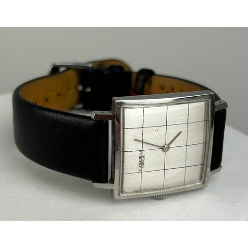 187C - GIRARD PERREGAUX: A STAINLESS STEEL WATCH WITH UNRELATED STRAP,