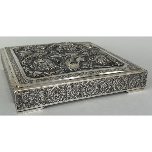 154 - AN ANTIQUE PERSIAN SILVER BOX HAND CHASED REPOUSSE WITH FLOWERS AND BIRDS OF PARADISE, 

Hallmarked ... 