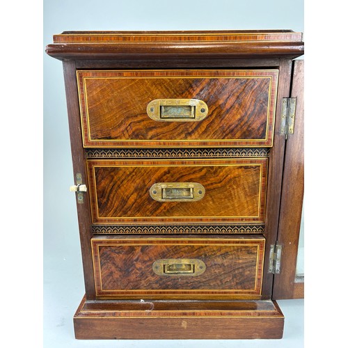 458A - A 19TH CENTURY ROSEWOOD TABLE TOP CABINET WITH GLAZED FRONT AND THREE DRAWERS WITH CAMPAIGN HANDLES