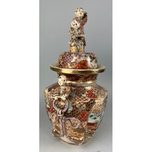 142 - A LARGE 19TH CENTURY JAPANESE SATSUMA VASE AND COVER,
 
Handles and finials formed as children. 

58... 