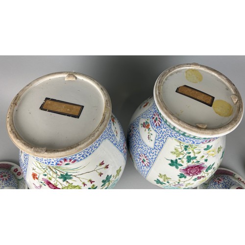 23B - A PAIR OF CHINESE 19TH CENTURY BALUSTER VASES AND COVERS, 

43cm x 25cm each. 

Enamelled with flowe... 