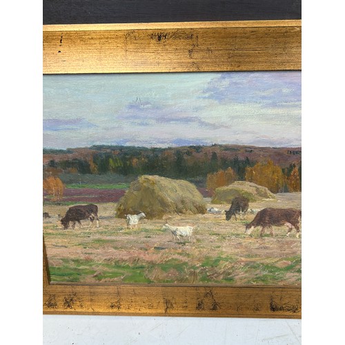 195 - ALEKSEI MIKHAILOVICH GRITSAI (1914-1998): AN OIL ON BOARD PAINTING DEPICTING CATTLE IN A FIELD WITH ... 