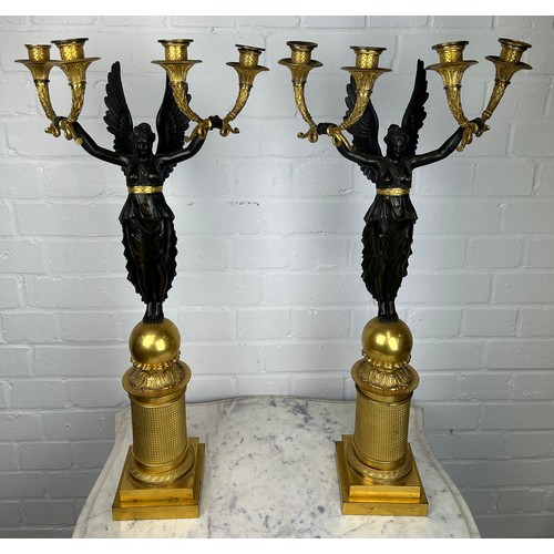 441 - A PAIR OF FRENCH EMPIRE DESIGN EARLY 20TH CENTURY GILT AND BRONZE FOUR-LIGHT CANDELABRA IN THE MANNE... 