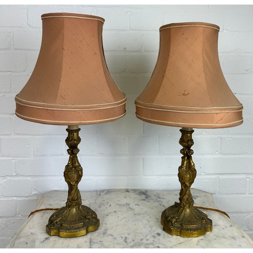 483 - A PAIR OF FRENCH BRONZE CANDLESTICKS AS LAMPS, 

27cm H each. 

With shades.