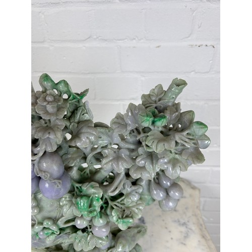 98 - A LARGE JADE SCULPTURAL GROUP DEPICTING BIRDS AMONGST FOLIAGE, 

40cm x 36cm