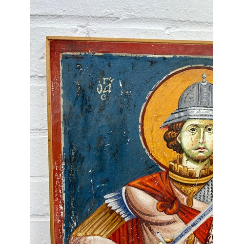 291 - A GREEK OR RUSSIAN RELIGIOUS TEMPERA PICTURE OF A SAINT INSCRIBED 'SAINT MERKOURIOUS',

75cm x 39cm