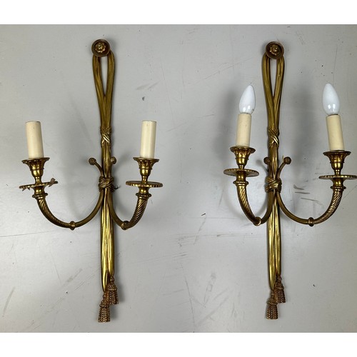 501 - A PAIR OF REGENCY STYLE GILT BRASS WALL SCONCES (2), 

63cm x 25cm each.