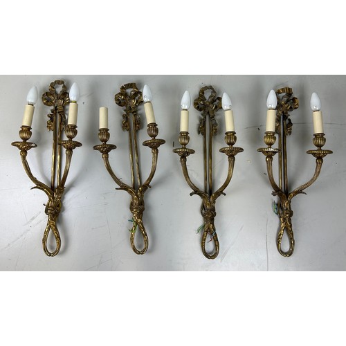 502 - TWO PAIRS OF REGENCY STYLE GILT BRASS WALL SCONCES (4) 

62cm x 25cm each