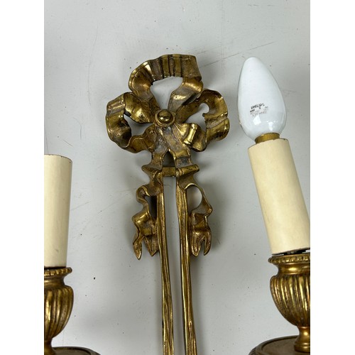 502 - TWO PAIRS OF REGENCY STYLE GILT BRASS WALL SCONCES (4) 

62cm x 25cm each