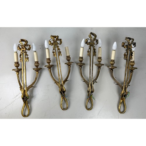 502 - TWO PAIRS OF REGENCY STYLE GILT BRASS WALL SCONCES (4) 

62cm x 25cm each