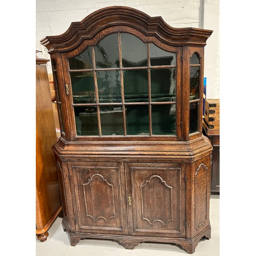 413 - A LARGE 19TH CENTURY OAK DRESSER WITH GLAZED GLASS PANELS OVER TWO DOORS,

Green lined interior and ... 