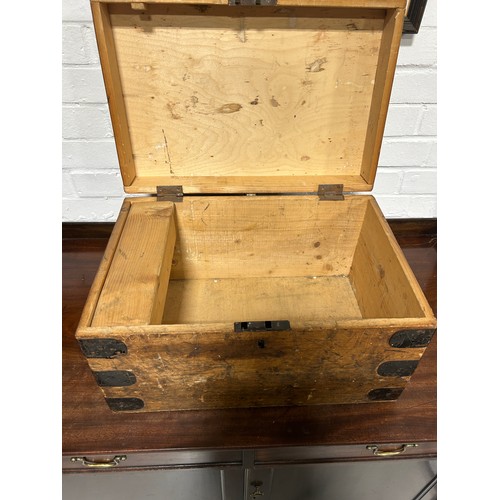 453 - AN OAK AND IRON BOUND TRAVELLING TRUNK, 

50cm x 33cm x 28cm