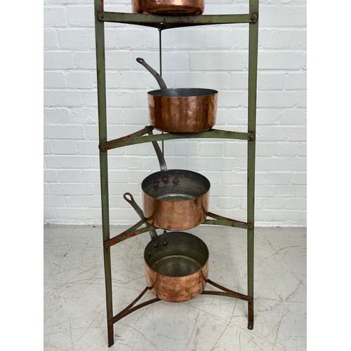 410B - A GRADUATED SET OF SIX COPPER PANS ON GREEN PAINTED IRON STAND, 

Stand 182cm H

Largest pan 22cm x ... 