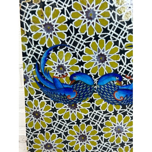 532 - A PERSIAN TILE DECORATED WITH BIRDS AND FLOWERS, 

49cm x 34cm