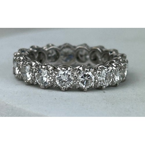 178 - AN 18CT WHITE GOLD ETERNITY RING CIRCA 1930'S,

17mm UK size N

4.5gms