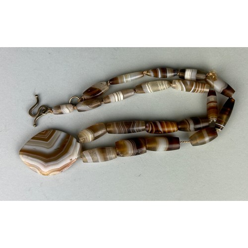 12 - A WESTERN ASIATIC BANDED AGATE BEAD NECKLACE CIRCA 3RD MILLENIUM B.C. / 2ND CENTURY A.D. ALONG WITH ... 