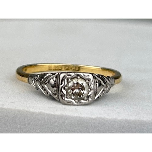 181 - AN 18CT GOLD AND PLATINUM RING WITH A DIAMOND,

Weight 3.6gms