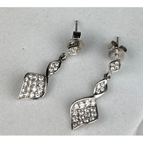 182 - A PAIR OF 18CT WHITE GOLD AND DIAMOND EARRINGS,

Weight: 2.8gms