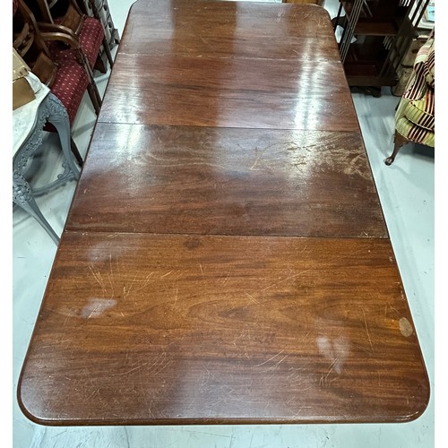 444 - A LARGE WILLIAM IV DINING TABLE WITH TWO LEAFS RAISED ON TURNED LEGS AND CASTORS,

225cm x 120cm x 7... 